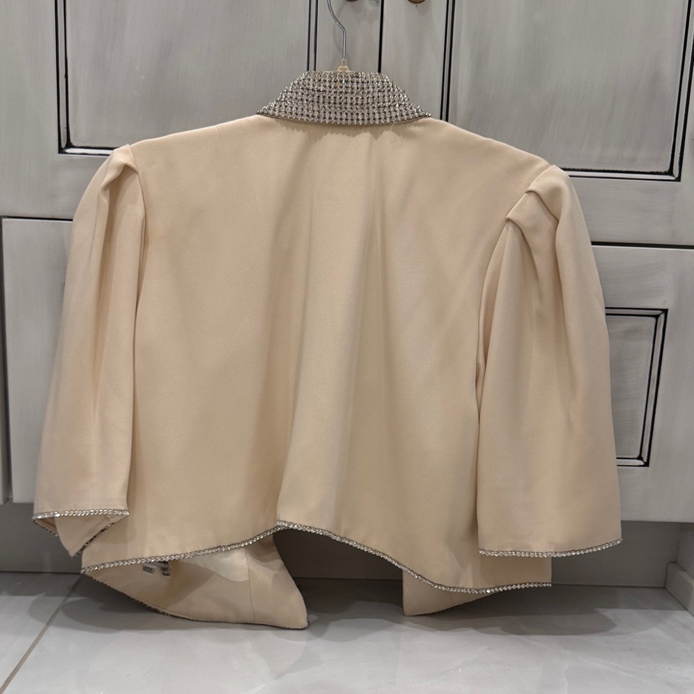 Elegant Cream Jacket with Embellished Collar